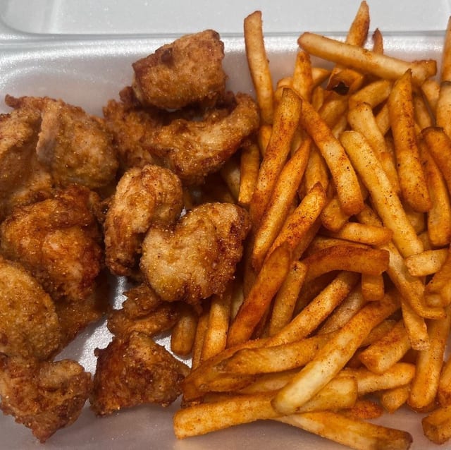 Crispy Chicken Bites with Fries.